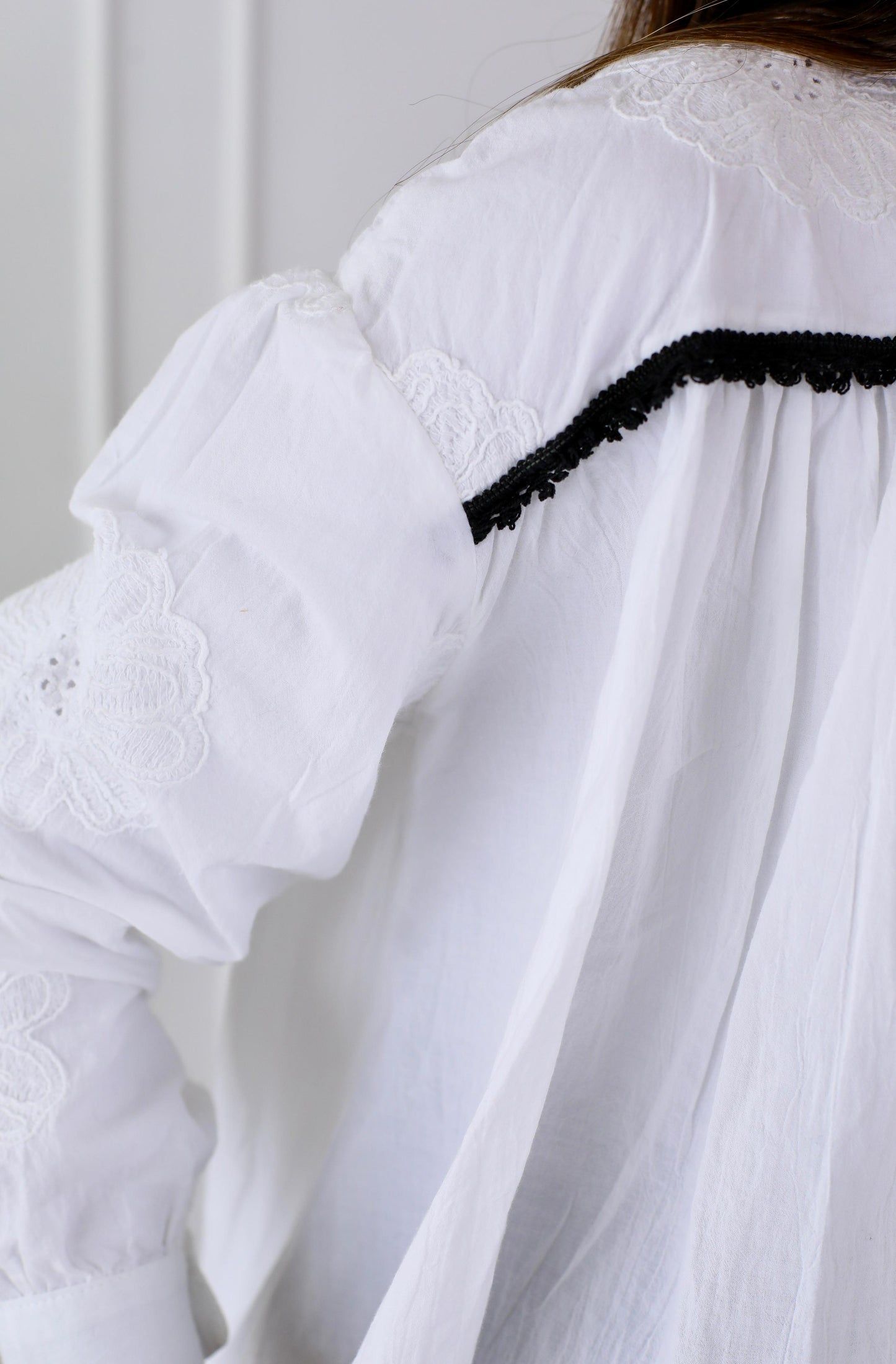 Chic White Button-Down Blouse with Embroidered Detailing