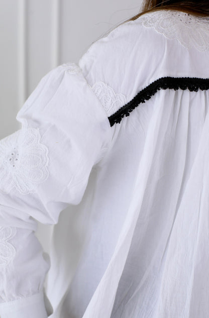 Chic White Button-Down Blouse with Embroidered Detailing